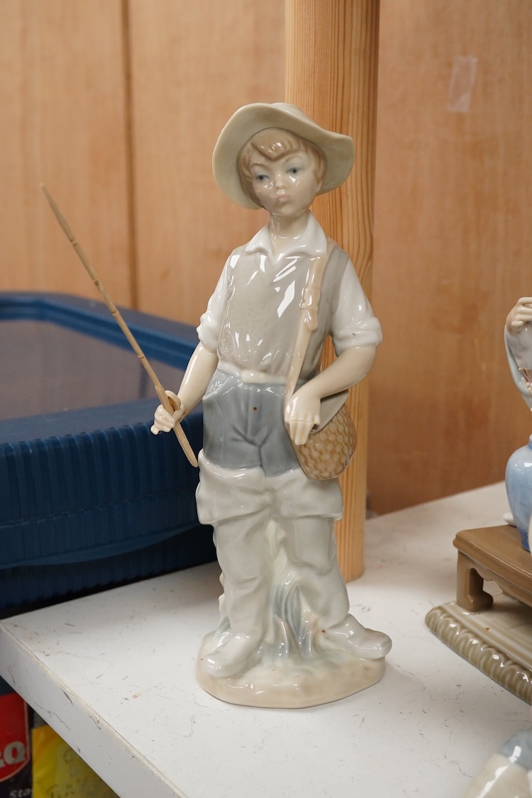 A collection of five Lladro figures, largest 24cm high